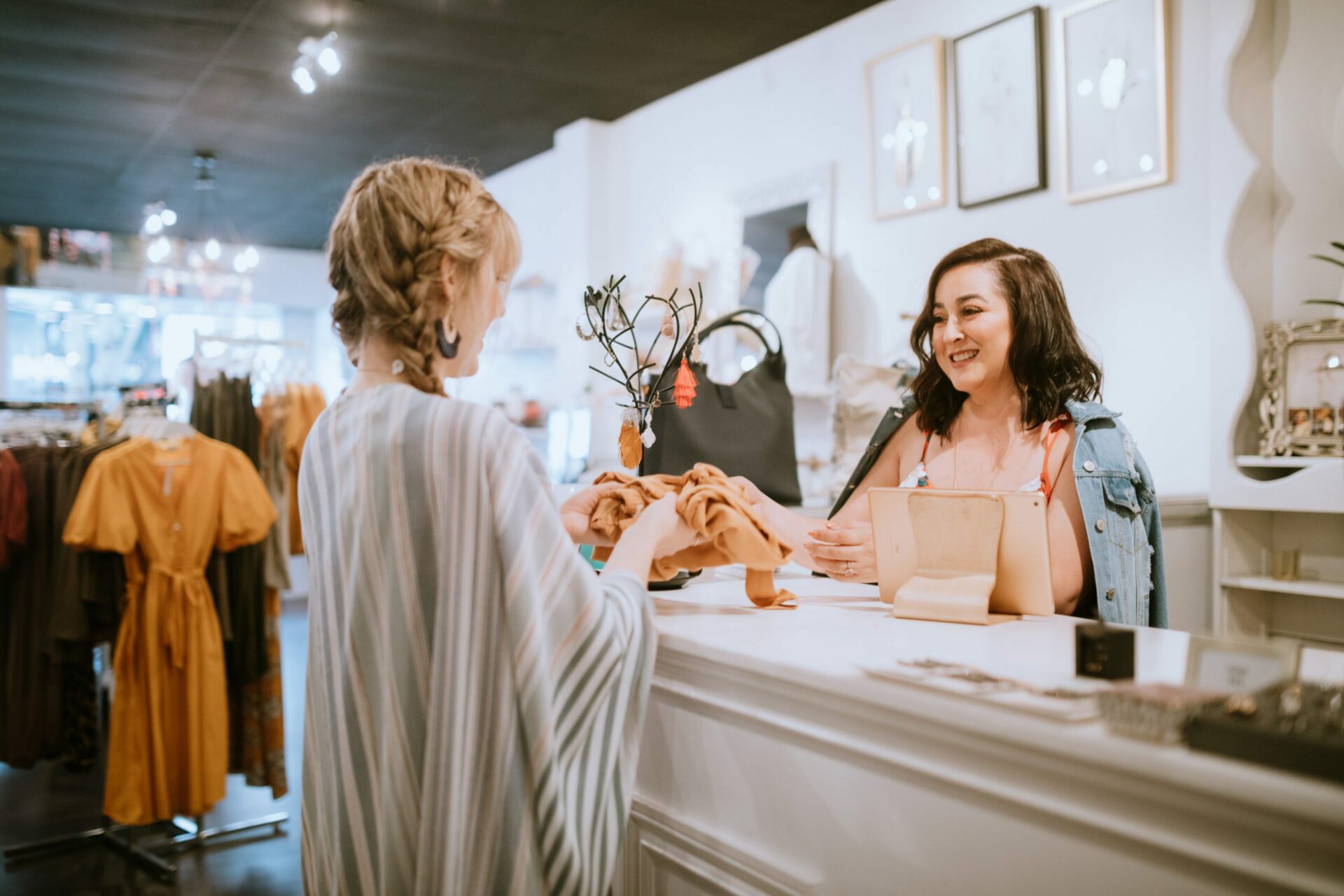 Latina Boutique Store Owner At Checkout Counter